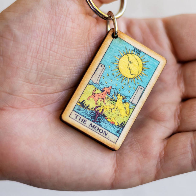 Wooden tarot keychain featuring The Moon card, ideal for spiritual and metaphysical enthusiasts.