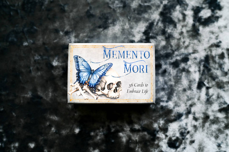 Memento Mori oracle card deck box with blue butterfly and skull, metaphysical tools