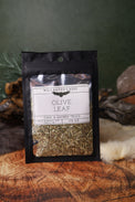 Olive Leaf dried herb in a 1/2 oz Wild Raven's Nest bag, Call a Sacred Truce
