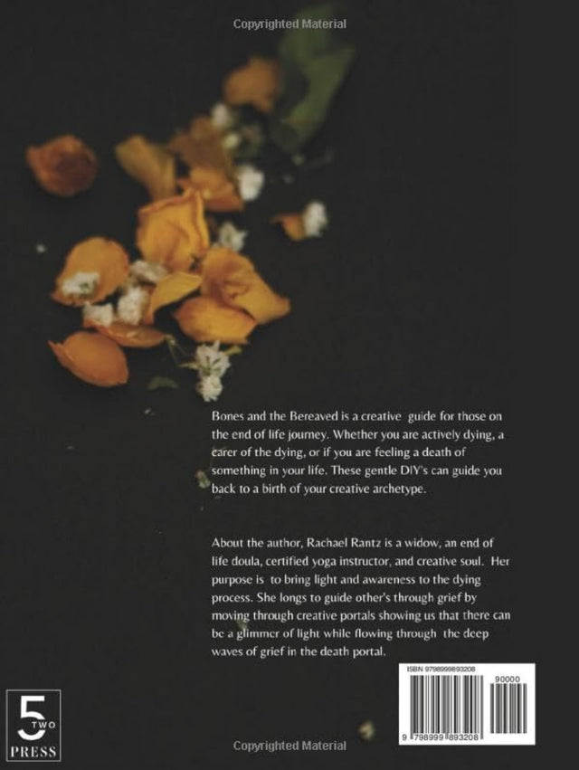 Book back cover with dried orange petals, white flowers, and text on grief, creativity, and spiritual healing