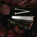 Oracle of the Vampire Fae tarot deck on a dark velvet surface, mystical and metaphysical vibe