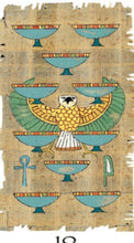 Egyptian-style tarot card with nine blue cups, a falcon with outstretched wings, an ankh, and Egyptian papyrus background