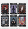 Six illustrated tarot cards featuring Addams Family characters and mystical themes on a white background.