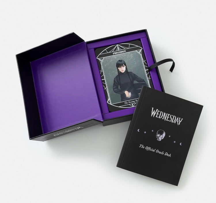 Wednesday oracle deck set with illustrated card and black guidebook in purple box